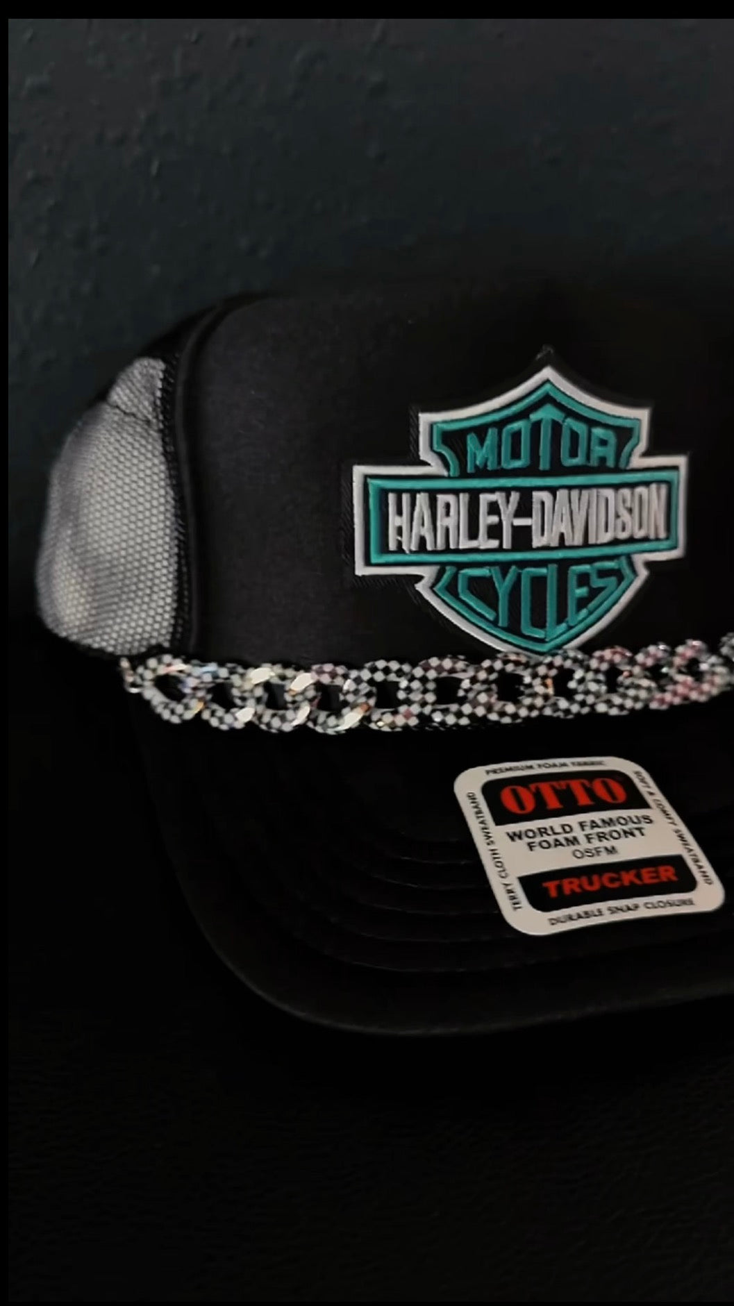 Teal chain trucker